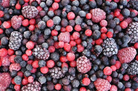 Close up of frozen mixed fruit  - berries - red currant, cranberry, raspberry, blackberry, bilberry, blueberry, black currant Stock Photo - Budget Royalty-Free & Subscription, Code: 400-05915113