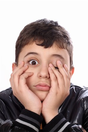 boy with bored expression on face over white Stock Photo - Budget Royalty-Free & Subscription, Code: 400-05915381
