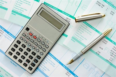 calculator,pen  and payroll summary details Stock Photo - Budget Royalty-Free & Subscription, Code: 400-05915398
