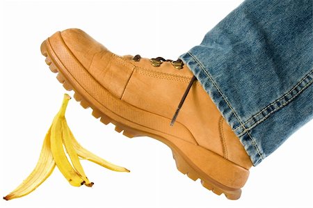 simsearch:400-08264445,k - Man stepping on banana peel. isolated on white background Stock Photo - Budget Royalty-Free & Subscription, Code: 400-05915400