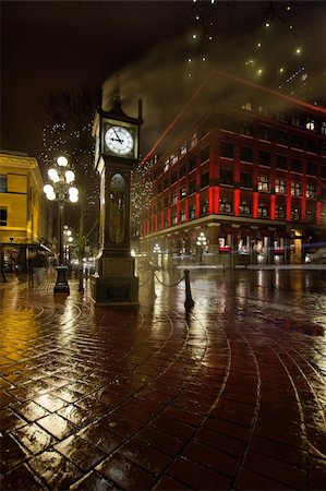 Gastown Steam Clock in Vancouver BC Canada on a Rainy Night with Historic Red Building Stock Photo - Budget Royalty-Free & Subscription, Code: 400-05916755