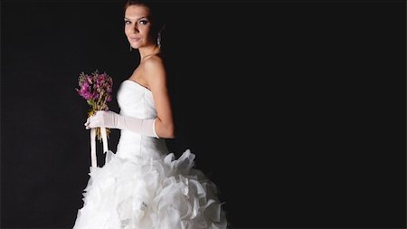 elegant bride hairstyle - Brunet bride portrait in studio isolated on black Stock Photo - Budget Royalty-Free & Subscription, Code: 400-05916802