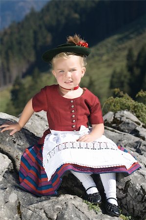 simsearch:400-07087495,k - Little blonde girl in typical Bavarian costume on the mountain Stock Photo - Budget Royalty-Free & Subscription, Code: 400-05916869