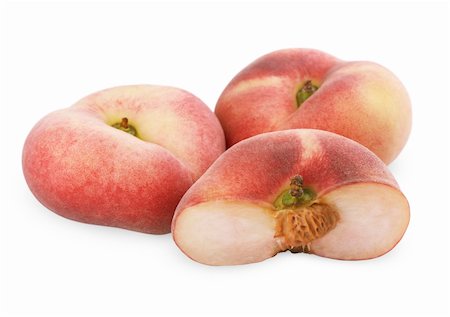 simsearch:400-07675974,k - Chinese flat peaches with half isolated on a white Stock Photo - Budget Royalty-Free & Subscription, Code: 400-05916977