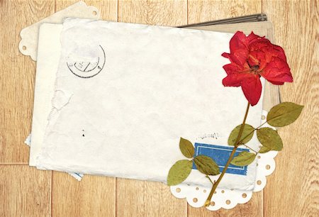simsearch:400-06912658,k - Old envelope and dry pose for scrapbooking design Photographie de stock - Aubaine LD & Abonnement, Code: 400-05917163