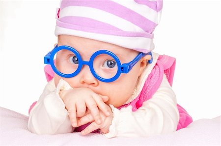 portrait of funny baby with glasses on white background Stock Photo - Budget Royalty-Free & Subscription, Code: 400-05917279