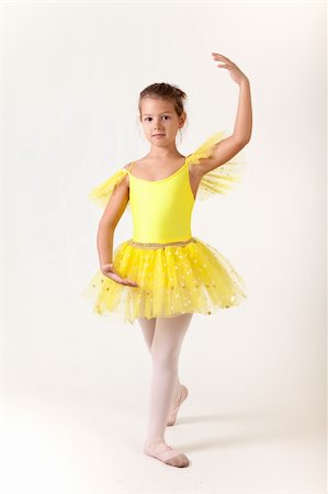 simsearch:400-07302639,k - Cute little girl as ballet dancer, studio shot on white background Stock Photo - Budget Royalty-Free & Subscription, Code: 400-05917599