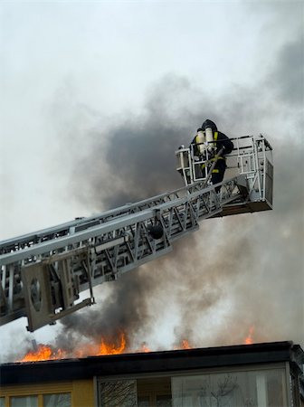 shadow hero - Fireman working on top of a ladder Stock Photo - Budget Royalty-Free & Subscription, Code: 400-05917601