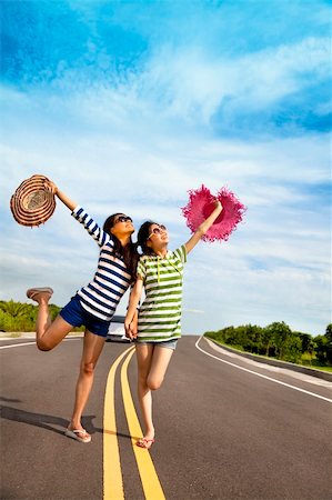 simsearch:400-04900515,k - two girls having fun on the road trip at summertime Stock Photo - Budget Royalty-Free & Subscription, Code: 400-05918042