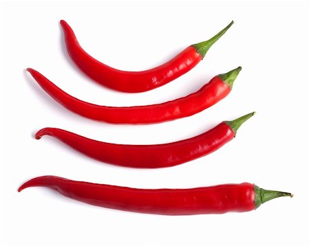 simsearch:400-04185368,k - Set of red hot chilli pepper isolated on white background with included clipping path. Foto de stock - Royalty-Free Super Valor e Assinatura, Número: 400-05918400