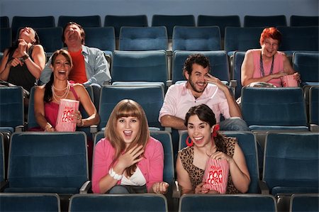 simsearch:400-06138368,k - Group of seven people laughing out loud in a theater Stock Photo - Budget Royalty-Free & Subscription, Code: 400-05918420