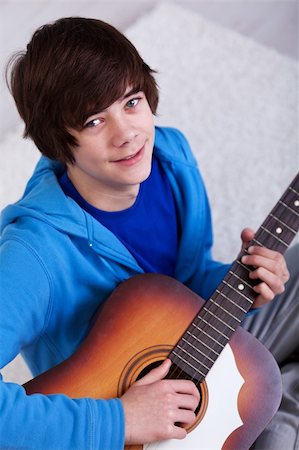 simsearch:400-04344925,k - Happy teenager with guitar - closeup Stock Photo - Budget Royalty-Free & Subscription, Code: 400-05919474