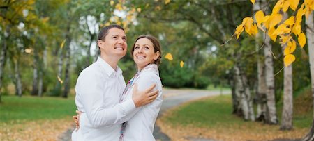 Portrait of romantic happy young beautiful couple on autumn walk Stock Photo - Budget Royalty-Free & Subscription, Code: 400-05910310