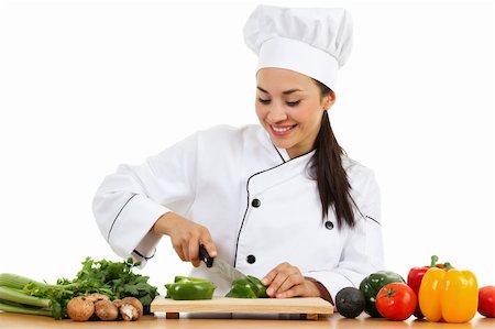 Stock image of female chef preparing food isolated on white background Stock Photo - Budget Royalty-Free & Subscription, Code: 400-05910337
