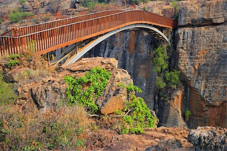 Bridge over the canyon at the Bourkes Luck potholes in the Blyde river, Mpumalanga, South Africa Stock Photo - Budget Royalty-Free & Subscription, Code: 400-05910464