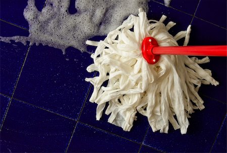 Cleaning a blue floor with a white mop Stock Photo - Budget Royalty-Free & Subscription, Code: 400-05910609