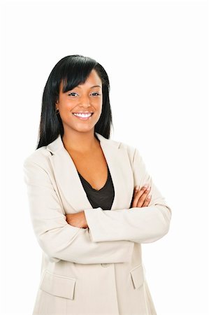 simsearch:400-05677069,k - Smiling black businesswoman with arms crossed isolated on white background Fotografie stock - Microstock e Abbonamento, Codice: 400-05910772