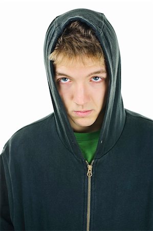 Young man with attitude wearing hoodie isolated on white background Foto de stock - Super Valor sin royalties y Suscripción, Código: 400-05910819