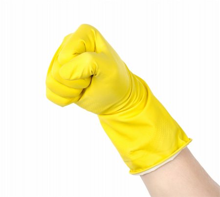 rubber hand gloves - The fist in a yellow glove is isolated on a white background Stock Photo - Budget Royalty-Free & Subscription, Code: 400-05911107