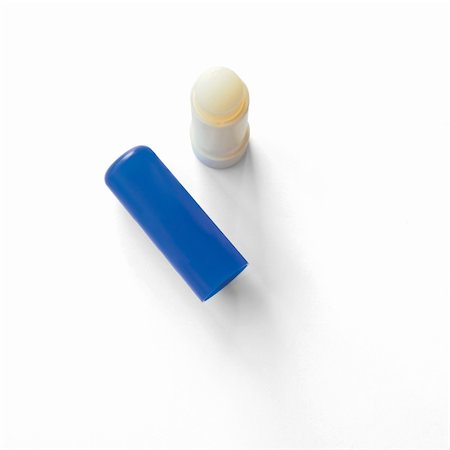 Lip balm on a white background with shadow Stock Photo - Budget Royalty-Free & Subscription, Code: 400-05911730