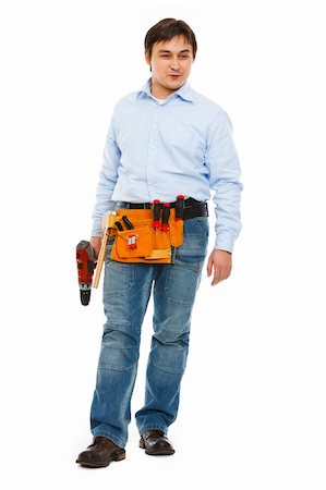 Full length portrait of construction worker looking on side Stock Photo - Budget Royalty-Free & Subscription, Code: 400-05911822