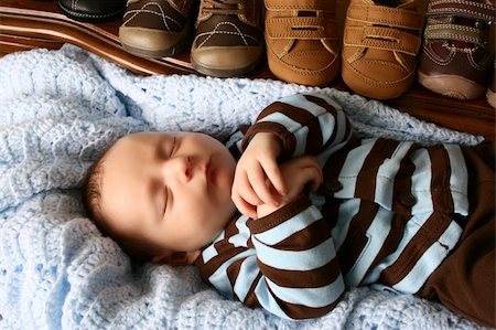 Baby boy sleeping in a warm blanket Stock Photo - Budget Royalty-Free & Subscription, Code: 400-05911844