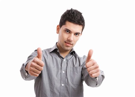 simsearch:400-04343310,k - Handsome young man with thumbs up on an isolated white background Photographie de stock - Aubaine LD & Abonnement, Code: 400-05912297