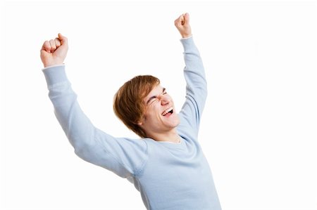 simsearch:400-05912369,k - Happy young man with arms raised in the air, isolated on white background Fotografie stock - Microstock e Abbonamento, Codice: 400-05912383