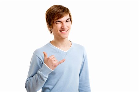 Handsome young man doing a surf gesture, isolated over a white background Stock Photo - Budget Royalty-Free & Subscription, Code: 400-05912390