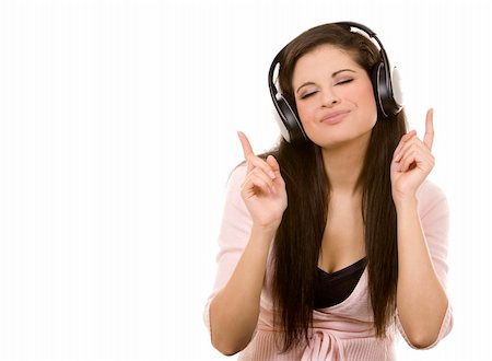 deejay (female) - beautiful brunette listening to music on white background Stock Photo - Budget Royalty-Free & Subscription, Code: 400-05912535