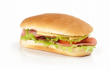 spaxiax (artist) - half of long baguette sandwich with lettuce, tomatoes, and ham Fotografie stock - Microstock e Abbonamento, Codice: 400-05913991