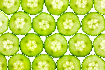 simsearch:400-07217319,k - Slices of fresh Cucumber / background / back lit Stock Photo - Budget Royalty-Free & Subscription, Code: 400-05927856