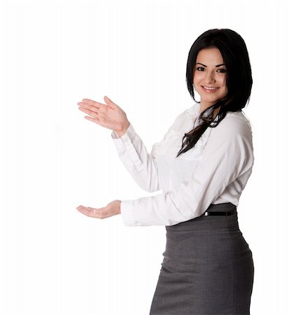 entrepreneur administration - Beautiful happy smiling young corporate business woman MBA student standing pointing at project presentation wearing white blouse amd grey dress skirt, isolated. Stock Photo - Budget Royalty-Free & Subscription, Code: 400-05920500