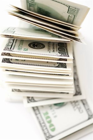 simsearch:693-06021333,k - one hundre dollar bills over white background Stock Photo - Budget Royalty-Free & Subscription, Code: 400-05920607