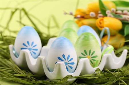 simsearch:400-04291976,k - Colorful Easter eggs in an egg holder. Shallow dof Photographie de stock - Aubaine LD & Abonnement, Code: 400-05920861
