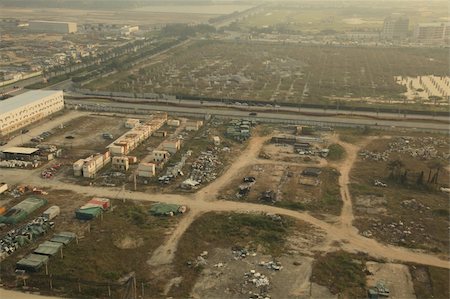 simsearch:700-06786709,k - Industrial Wasteland in China with Pollution Smog Foto de stock - Royalty-Free Super Valor e Assinatura, Número: 400-05920922