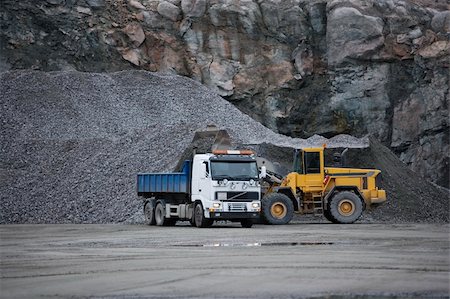dump truck at open pit mine - Trucks at a pit mine Stock Photo - Budget Royalty-Free & Subscription, Code: 400-05922925