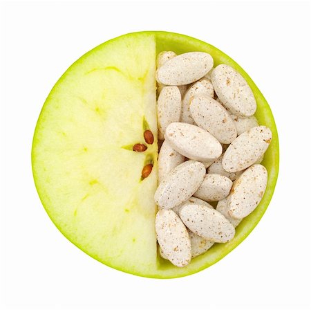 simsearch:400-06387340,k - Close up of apple and pills isolated - vitamin concept Foto de stock - Super Valor sin royalties y Suscripción, Código: 400-05935093