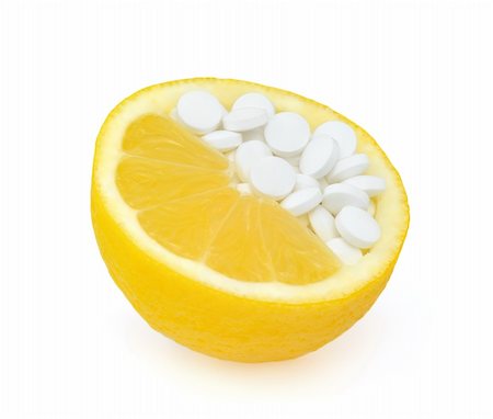 simsearch:400-04880039,k - Close up of lemon and pills isolated - vitamin concept Foto de stock - Super Valor sin royalties y Suscripción, Código: 400-05935101