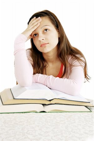 simsearch:400-04829236,k - teenage girl leans to opened books, tired of learning, dreaming Stock Photo - Budget Royalty-Free & Subscription, Code: 400-05946451