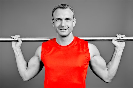 An image of a fit man in a red shirt Stock Photo - Budget Royalty-Free & Subscription, Code: 400-05946671