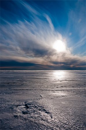 dmitryelagin (artist) - Beautiful blue and cloudy sky over ice lake in Saint-Petersburg, Russia Stock Photo - Budget Royalty-Free & Subscription, Code: 400-05946735