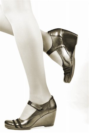 simsearch:400-06137029,k - elegant shoes on women's feet Photographie de stock - Aubaine LD & Abonnement, Code: 400-05946829
