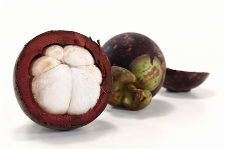 cut mangosteen fruit on a light background Stock Photo - Budget Royalty-Free & Subscription, Code: 400-05946932