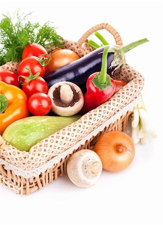 simsearch:400-05939266,k - fresh vegetables with leaves in the basket isolated on white background Photographie de stock - Aubaine LD & Abonnement, Code: 400-05947444