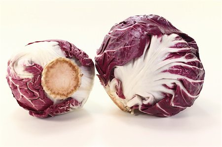 two fresh raw radicchio on a light background Stock Photo - Budget Royalty-Free & Subscription, Code: 400-05947581