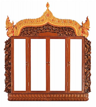 Beautifully decorated old bookcase in the room Buddhist Church Stock Photo - Budget Royalty-Free & Subscription, Code: 400-06064220