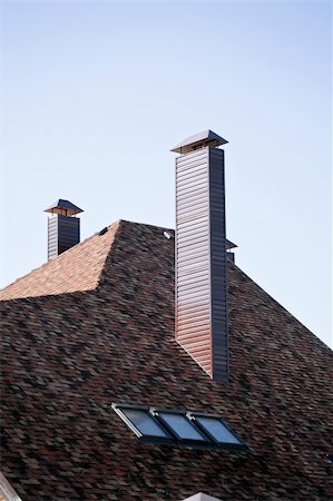 Roof and pipe of a modern apartment house in suburban settlement Stock Photo - Budget Royalty-Free & Subscription, Code: 400-06064533
