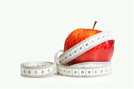 simsearch:400-08532856,k - Red apple with tape measure on white background Stock Photo - Budget Royalty-Free & Subscription, Code: 400-06064767