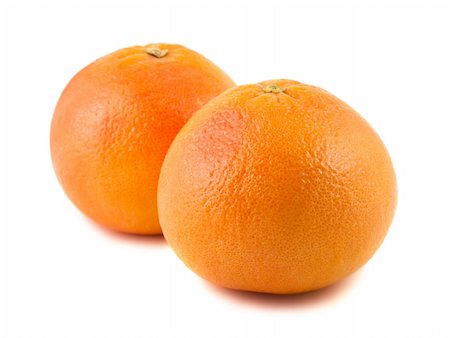 simsearch:400-05316300,k - Two ripe grapefruits isolated on white background Stock Photo - Budget Royalty-Free & Subscription, Code: 400-06065167